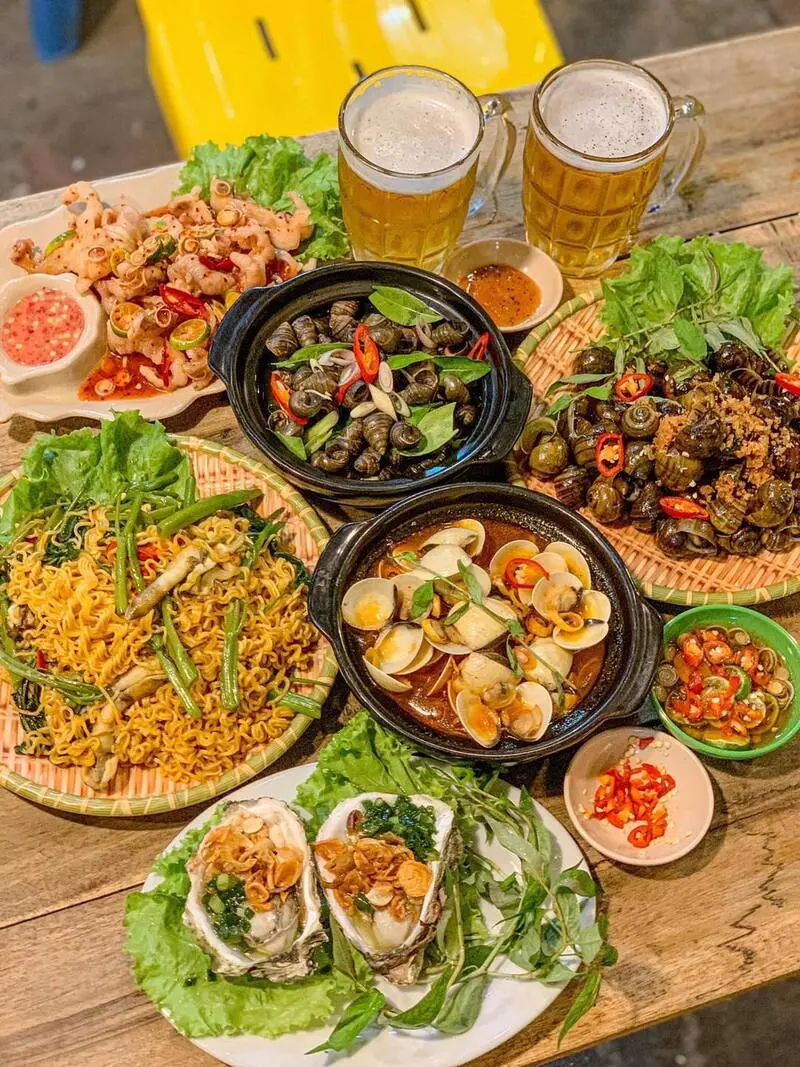 Top 11 qu&aacute;n ốc đ&ecirc;m H&agrave; Nội lan tỏa hương vị ấm nồng 5